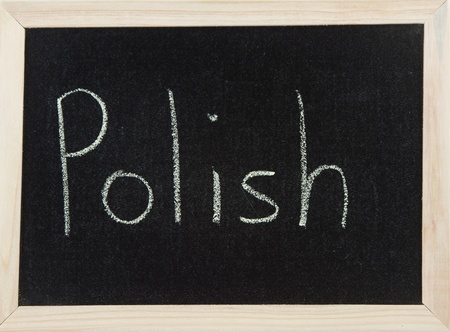 A black board with a wooden frame and the word 'POLISH' written in chalk.の写真素材