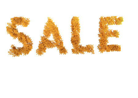 Glossy gold three-dimensional inscription Sale as a sign.の写真素材