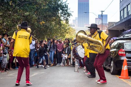 Johannesburg, South Africa, April 29-2018: Buskers playing on the streets. Brass band performing in the city.のeditorial素材
