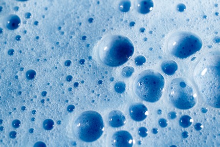 Abstract shot of bubbles on blue backgroundの写真素材