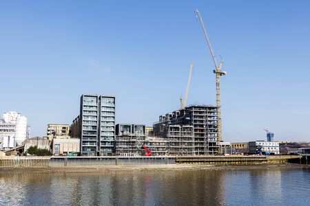 Waterfront Apartments Under Construction on the River Thames in Londonのeditorial素材