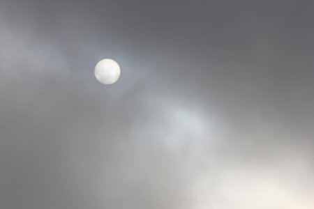 Autumn Morning Sky with the sun obscured by Clouds
