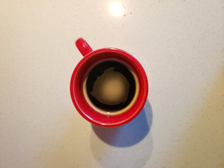 Coffee in a Red Mug Looking From Aboveの写真素材