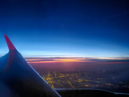 Night Lights of a Florida City with an Approaching Sunrise, Seen from a Plane