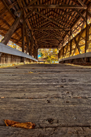 Mink Hollow Covered Bridge in Autumn, Arney Run Park, Lancaster, Ohioの写真素材