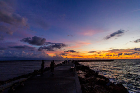 View of a Colorful Sunset, Jetty Park, Fort Pierce, Floridaの写真素材
