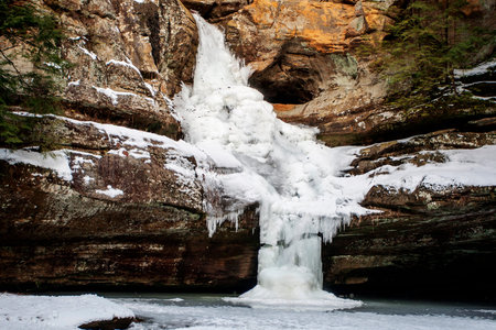 Cedar Falls Frozen in Winter, Hocking Hills State Park, Ohioの写真素材