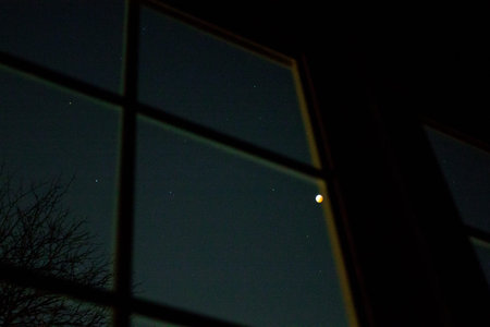 Looking at a Total Lunar Eclipse Through a Window