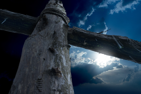 Closeup Cross of Jesus at Night in the Rainの写真素材