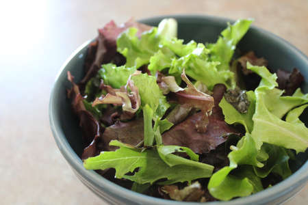 Bowl of salad on Kitchen counter topの写真素材