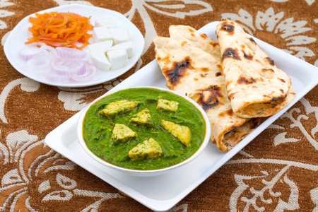 Indian Healthy Cuisine Palak Paneer Served With Tandoori Roti or Salad Made Up of Spinach And...
