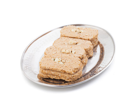 Indian Sweet Gud Kaju Gajak Isolated on White Background