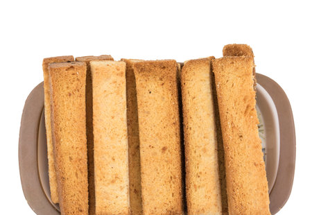 Indian Bakery Food Tea Time Sweet Dry Toast Snack Also Know As Indian Toast Snack, Toasted, Bread, Long Toast, Mawa Toast isolated on White Backgroundの写真素材