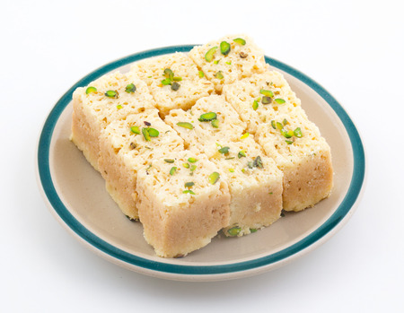 Indian Traditional Famous Sweet Food Mysore Pak or Mysoor Pak Isolated on White Backgroundの写真素材