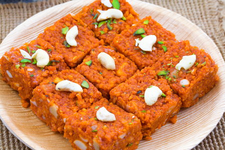 Indian Sweet Food Akhrot Halwa Also Called Walnut Burfi or Akhrot Ka Sheera Made From Walnut, Khoya, Milk or Flavourの写真素材