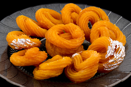 Paneer Jalebi, also Know as Chhena Jalebi, Chhena Jilapi or Zulbia is a Indian Sweet Foodの写真素材