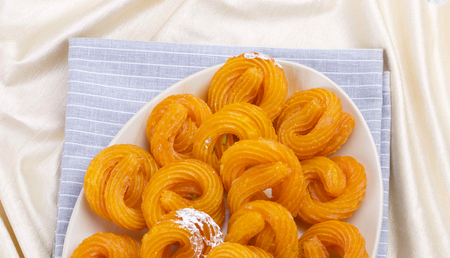 Paneer Jalebi, also Know as Chhena Jalebi, Chhena Jilapi or Zulbia is a Indian Sweet Foodの写真素材