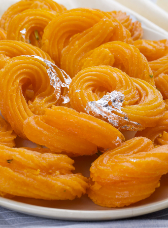 Paneer Jalebi, also Know as Chhena Jalebi, Chhena Jilapi or Zulbia is a Indian Sweet Foodの写真素材