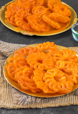 Indian Traditional Sweet Imarti Also Know as Amriti, Omriti, Jahangir, Jalebi, Jaangiri. It is Mde...