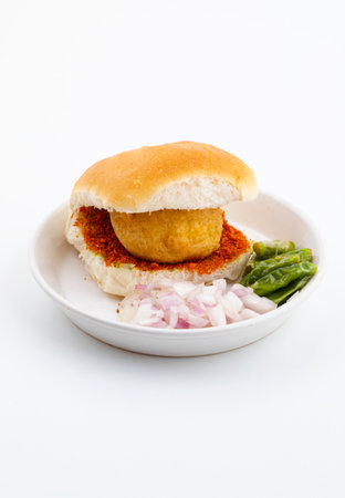 Indian Famous Street Food Vada Pav Also Know as Vada Paav, Wada Pav or Wada Pao is a Vegetarian Fast Food Dish From Maharashtraの写真素材