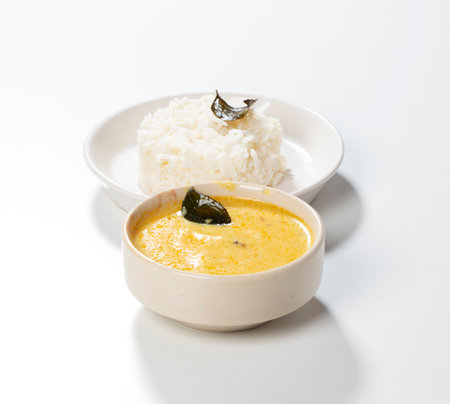 Indian Traditional Cuisine Kadhi Chawal Also Know as Curry Chawal, Yogurt Curry with Rice Isolated on White Backgroundの写真素材