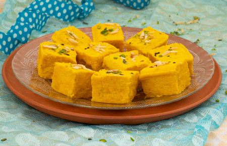 Indian Special Traditional Sweet Food Soan Papdi Also Know as Son Roll, Soam Papdi, Patisa, Shonpapdi is a popular Indian Dessertの写真素材