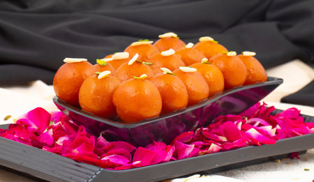 Indian Popular Dessert Gulab Jamun Also know as kala Jamun or Kalajam is a Soft Delicious Berry...