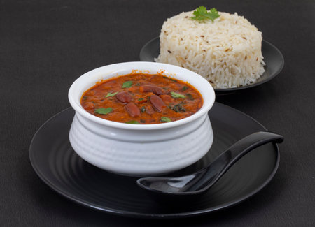 Rajma Chawal or Rajma Jeera Chawal (Rice) is a Traditional North Indian Food, Consisting of Cooked Red Kidney Beans in a Thick Gravy with Spices. Served with Jeera Riceの写真素材