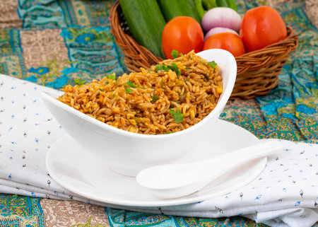 Vegetarian Fried Rice Or Pulav is a Dish of Cooked Rice That Has Been Stir-Fried in a Wok or a Frying Pan And is Usually Mixed with Other Ingredientsの写真素材
