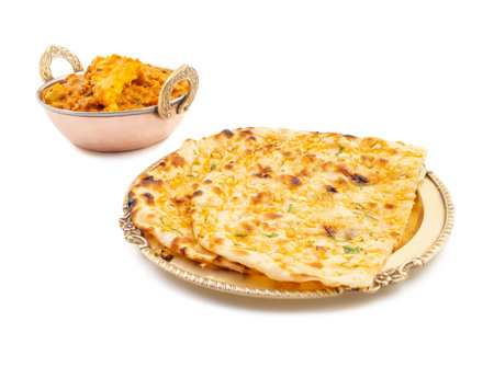 Indian Vegetarian Cuisine Special Sweet And Spicy Paneer Pasanda or Stuffed Paneer Curry, Delicacy Consisting of Stuffed Paneer with Rich Creamy Gravy Served With Garlic Naanの写真素材