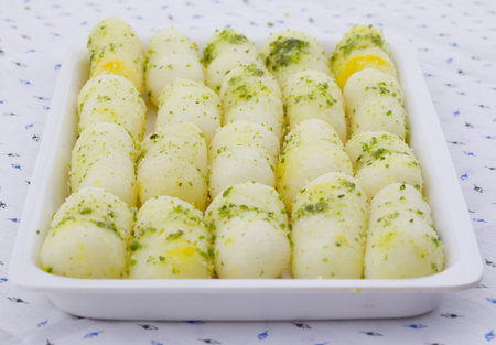 Indian Traditional Sweet Food Long Rasgulla Also Know as Rosogolla, Roshogolla, Rasagola, Ras Gulla, Anguri Rasgulla or Angoori Rasgulla is a Syrupy Dessert Popular in India.の写真素材