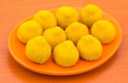 Indian Sweet Food Modak Also Know as Laddu, Khoya, khova Modak, Kozhakkatta, Modhaka, Kadubu,...