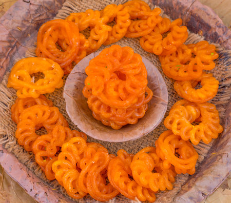 Indian Traditional Sweet Imarti Also Know as Amriti, Omriti, Jahangir, Jalebi, Jaangiri. It is Mde...