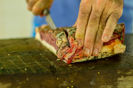 cut the meat on a table of woodの写真素材