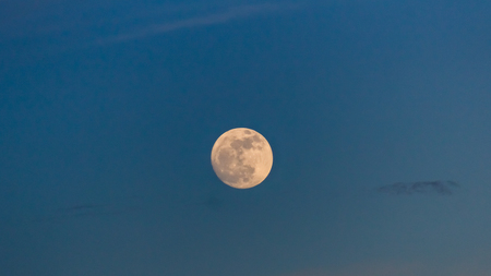 beautiful moon at the sunsetの写真素材