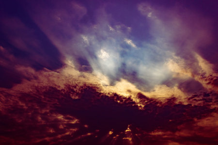 Beautiful sunset sky with clouds. Nature background. Vintage toned sky of apocalysis
