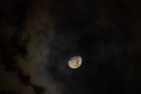 The moon in the night sky in full moonlight, Thailand.の写真素材