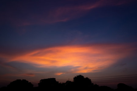 Sunset sky with clouds in the evening. Beautiful nature background.