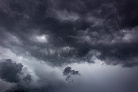 Dark and Dramatic Storm Clouds Area Background Great For Any Use.の写真素材