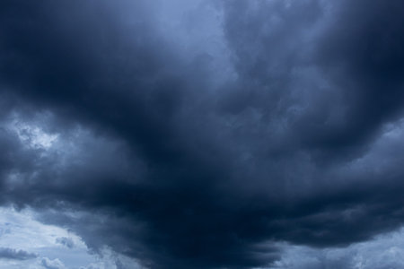 Dramatic sky with dark storm clouds before a thunderstorm.