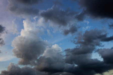 Clouds before a thunderstorm at sunset as a background.