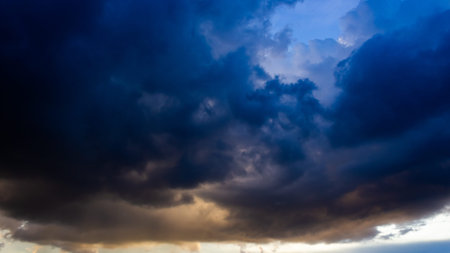 Dramatic sky with dark clouds before a thunderstorm.