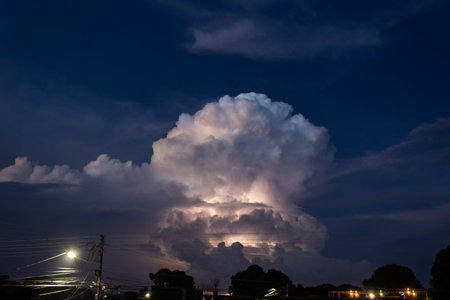 Stormy cloud in the dark sky at night. Thunderstorm.
