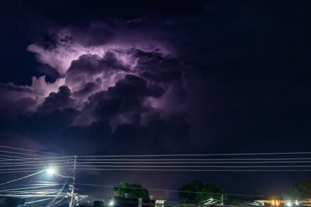 Lightning strike in the night sky with clouds. Lightning strike in the night sky.