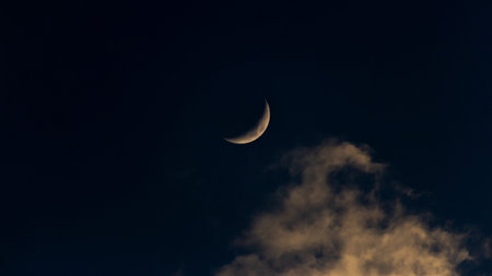 Moon and clouds in the night sky, beautiful photo digital picture.