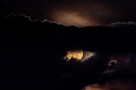 Full moon in the night sky with clouds, Thailand. (with clipping path)