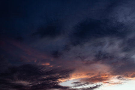 Cloudscape, Colored Clouds at Sunset near the Ocean as a Background