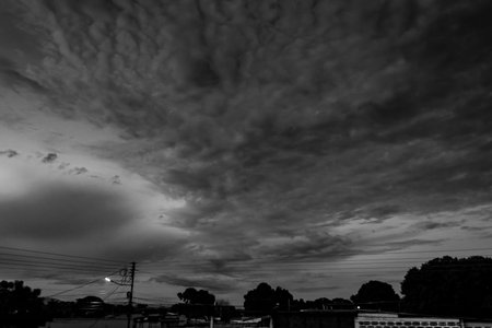 Black and white dramatic sky with cloud at sunset or sunrise background.