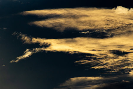 Clouds in the sky at sunset as a background. Toned.の写真素材