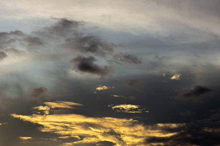 Cloudscape, Colored Clouds at Sunset near the Ocean on a Cloudy Day